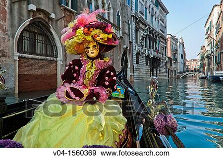 A masked woman in a gondola at the carnival in Venice, Italy, Europe View Large Photo Image Stock Photo - A masked woman in a gondola at the carnival in Venice, Italy, Europe. Fotosearch