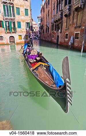 A masked woman in a gondola at the carnival in Venice, Italy, Europe View Large Photo Image Stock Photo - A masked woman in a gondola at the carnival in Venice, Italy, Europe. Fotosearch