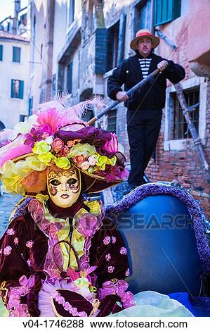 A masked woman in a gondola at the carnival in Venice, Italy, Europe View Large Photo Image Stock Photo - A masked woman in a gondola at the carnival in Venice, Italy, Europe. Fotosearch