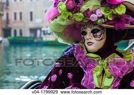A masked woman in a gondola at the carnival in Venice, Italy, Europe View Large Photo Image Stock Photo - A masked woman in a gondola at the carnival in Venice, Italy, Europe. Fotosearch