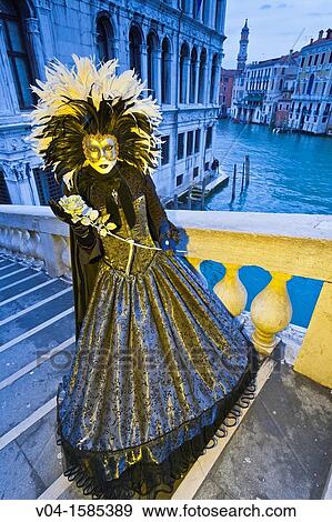 A masked woman on the Rialto Bridge at the carnival in Venice, Italy, Europe View Large Photo Image Stock Photo - A masked woman on the Rialto Bridge at the carnival in Venice, Italy, Europe. Fotosearch