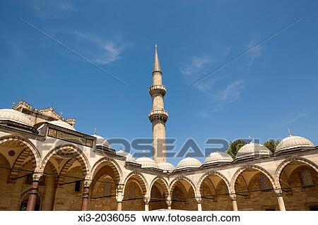 Stock Photography - A minaret and arches, Suleymaniye Mosque, from the inner courtyard, Istanbul, Turkey.. Fotosearch