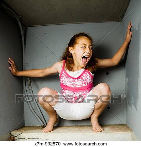 A mixed race girl Mexican & caucasian trapped in a box View Large Photo Image Stock Image - A mixed race girl Mexican & caucasian trapped in a box. Fotosearch