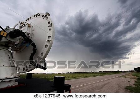 A mobile Doppler Radar truck scans a storm near Pickstown, South Dakota, June 3, 2010 View Large Photo Image Stock Photography - A mobile Doppler Radar truck scans a storm near Pickstown, South Dakota, June 3, 2010. Fotosearch
