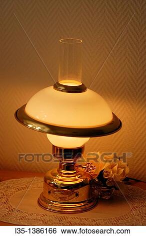 A modern table lamp looks like old View Large Photo Image Stock Photograph - A modern table lamp looks like old. Fotosearch