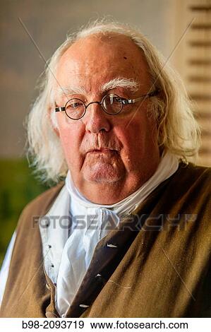 A museum docent dressed in the persona of Benjamin Franklin at the Historic Cold Spring Village in Cape May. View Large Photo Image Stock Photo - A museum docent dressed in the persona of Benjamin Franklin at the Historic Cold Spring Village in Cape May.. Fotosearch