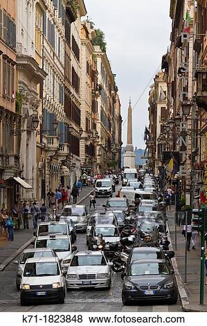 A narrow street with cars in central Rome, Italy View Large Photo Image Stock Photo - A narrow street with cars in central Rome, Italy. Fotosearch