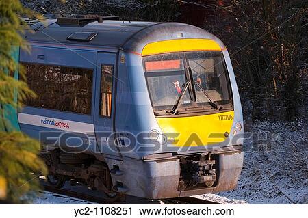 A National Express diesel locomotive train on the Suffolk line in the snow in the Uk View Large Photo Image Stock Image - A National Express diesel locomotive train on the Suffolk line in the snow in the Uk. Fotosearch