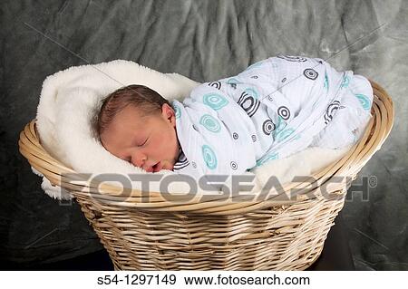 Stock Photo - A newborn baby boy, three days old. Fotosearch