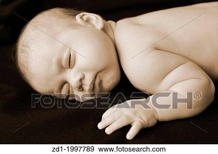A newborn baby sleep in peace. View Large Photo Image Stock Photo - A newborn baby sleep in peace.. Fotosearch