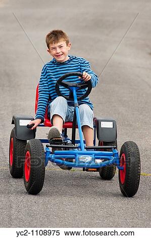 A nine year old boy on a Berg go cart in the Uk View Large Photo Image Stock Photography - A nine year old boy on a Berg go cart in the Uk. Fotosearch