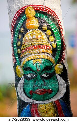 Stock Photo - A painted tree on Varkala beach, Kerala, Indian Subcontinent.. Fotosearch