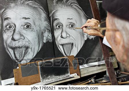 Stock Image - A painter copying a picture of Albert Einstein. Fotosearch