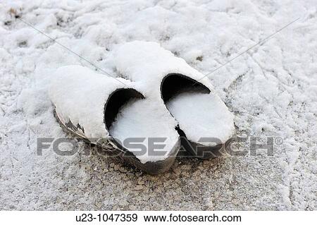 A pair of clogs covered with snow View Large Photo Image Stock Photo - A pair of clogs covered with snow. Fotosearch