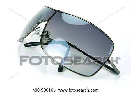 A pair of sunglasses isolated against a white background View Large Photo Image Stock Photography - A pair of sunglasses isolated against a white background. Fotosearch