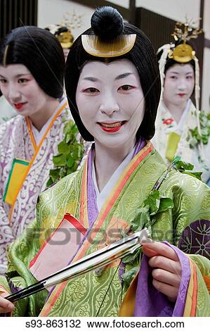 Stock Image - A participant in the Aoi matsuri dressed as a lady of the court in Heian period in Kyoto city.. Fotosearch
