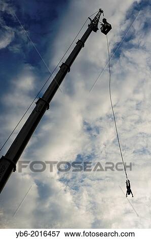 A person bungee Jumping during the Przystanek Woodstock - Europe's largest open air Music festival in Kostrzyn, Poland. View Large Photo Image Stock Photo - A person bungee Jumping during the Przystanek Woodstock - Europe's largest open air Music festival in Kostrzyn, Poland.. Fotosearch
