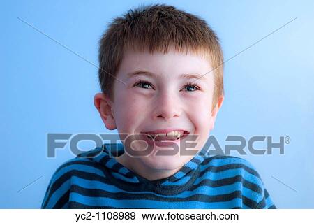 A picture of a ten year old boy laughing in his bedroom in the Uk View Large Photo Image Stock Photo - A picture of a ten year old boy laughing in his bedroom in the Uk. Fotosearch