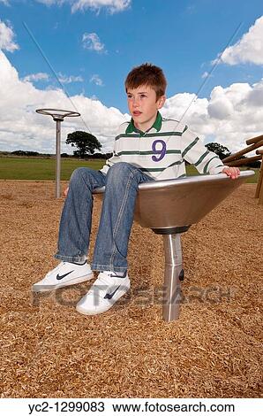 A picture of an eleven year old boy in a play park in the Uk View Large Photo Image Stock Image - A picture of an eleven year old boy in a play park in the Uk. Fotosearch
