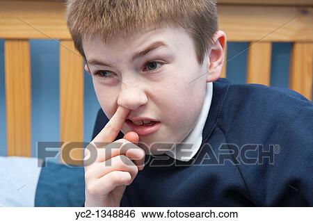 A picture of an eleven year old boy picking his nose in his bedroom in the Uk View Large Photo Image Stock Photograph - A picture of an eleven year old boy picking his nose in his bedroom in the Uk. Fotosearch
