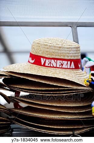 A pile of straw hats, as worn by Venetian Gondoliers, for sale on a stall in Venice, Italy, Europe View Large Photo Image Stock Photography - A pile of straw hats, as worn by Venetian Gondoliers, for sale on a stall in Venice, Italy, Europe. Fotosearch