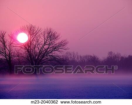 Stock Image - A pink sunrise, Pennsylvania, USA.. Fotosearch