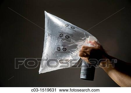 A plastic bag is filled by an aerosol inhalant gas can for illegal use as a drug View Large Photo Image Stock Image - A plastic bag is filled by an aerosol inhalant gas can for illegal use as a drug. Fotosearch