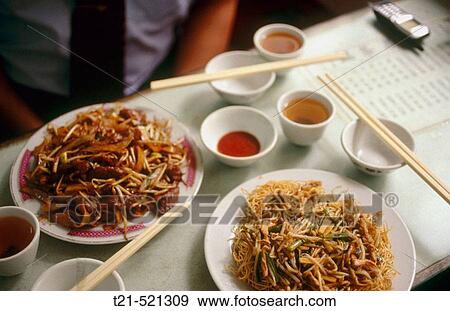 Stock Photo - A plate of noodles in a restaurant in Macau, the former Portuguese colony. China.. Fotosearch