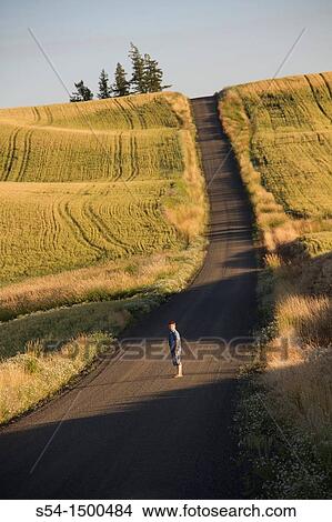 A preteen caucasian male outdoors in the country near Fairfield, Washington, USA. View Large Photo Image Picture - A preteen caucasian male outdoors in the country near Fairfield, Washington, USA.. Fotosearch