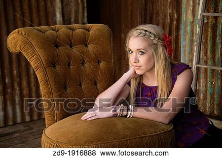 A pretty blone teenager in a vintage mood View Large Photo Image Stock Photo - A pretty blone teenager in a vintage mood. Fotosearch