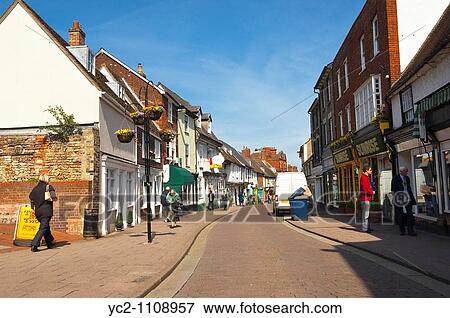 A pretty street with shoppers in Bury Saint Edmunds, Suffolk, England, Great Britain, UK View Large Photo Image Stock Photo - A pretty street with shoppers in Bury Saint Edmunds, Suffolk, England, Great Britain, UK. Fotosearch
