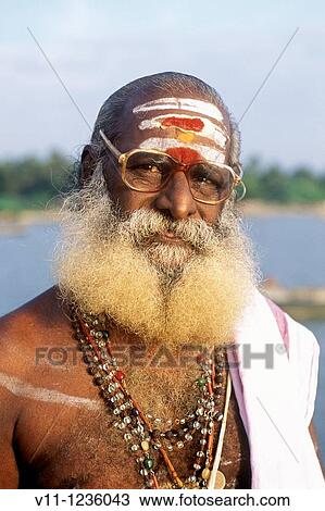 A priest at Devipattinam near Ramanathapuram, Tamil Nadu. View Large Photo Image Stock Image - A priest at Devipattinam near Ramanathapuram, Tamil Nadu.. Fotosearch
