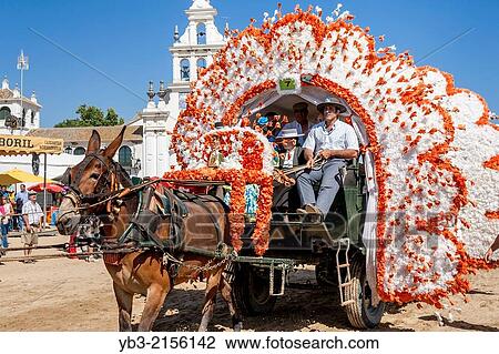 A Procession of Horses and Wagons, El Rocio Festival, El Rocio, Andalusia, Spain. View Large Photo Image Stock Image - A Procession of Horses and Wagons, El Rocio Festival, El Rocio, Andalusia, Spain.. Fotosearch
