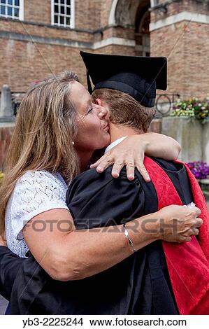 A Proud Mother and Her Graduate Son At The University of Western England (UWE) Degree Ceremony, Bristol, England. View Large Photo Image Picture - A Proud Mother and Her Graduate Son At The University of Western England (UWE) Degree Ceremony, Bristol, England.. Fotosearch