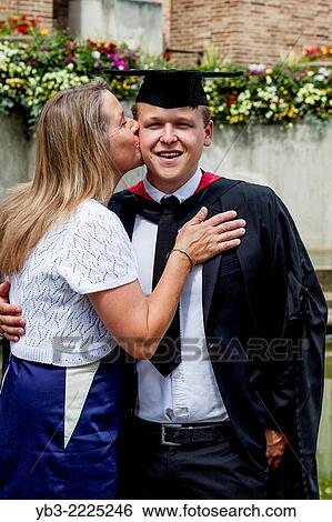 A Proud Mother and Her Graduate Son At The University of Western England (UWE) Degree Ceremony, Bristol, England. View Large Photo Image Stock Photograph - A Proud Mother and Her Graduate Son At The University of Western England (UWE) Degree Ceremony, Bristol, England.. Fotosearch