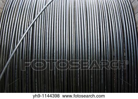 Stock Photo - A Reel of Black Cable. Fotosearch