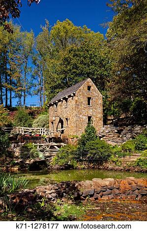 Stock Photo - A restored grist mill in Old Mill Park in Little Rock, Arkansas, USA. Fotosearch