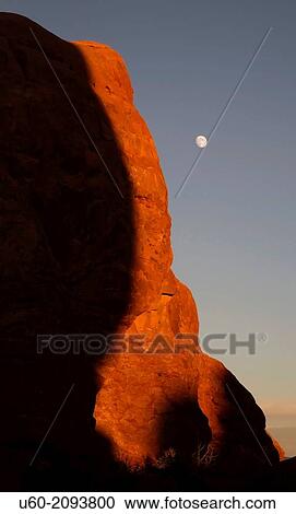 A rising moon appears over the landscape at Arches National Park, Utah. View Large Photo Image Stock Image - A rising moon appears over the landscape at Arches National Park, Utah.. Fotosearch