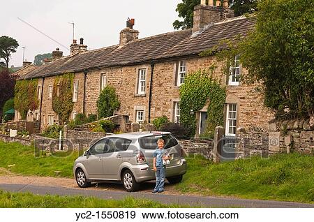 A row of cottages in Swaledale in North Yorkshire, England, Britain, Uk View Large Photo Image Stock Photo - A row of cottages in Swaledale in North Yorkshire, England, Britain, Uk. Fotosearch