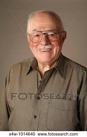 Stock Image - A senior citizen man poses for a portrait. Fotosearch