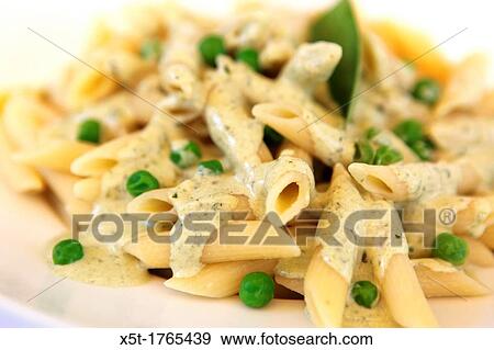 A serving of Penne pasta with herbs and cheese View Large Photo Image Stock Photo - A serving of Penne pasta with herbs and cheese. Fotosearch