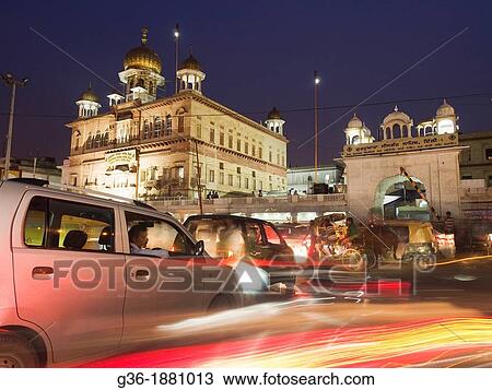 Stock Image - A Sheesh Gunj Gurudwara at twilight in the Chandni Chowk area of Delhi, India.. Fotosearch