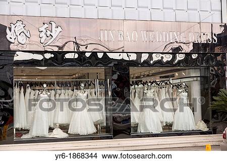 Picture - A shop selling western style wedding gowns in Suzhou, China Suzhou is one of the largest producers of wedding dresses in the world. Fotosearch
