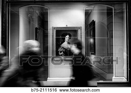 A shop window of an Art Gallery with a hung picture and unrecognizable people walking on the street in motion. London, England, UK, Europe. View Large Photo Image Stock Photograph - A shop window of an Art Gallery with a hung picture and unrecognizable people walking on the street in motion. London, England, UK, Europe.. Fotosearch