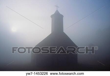 Stock Photograph - A small church in the vicinity of Caulin village on Chiloe Island, Chile. Fotosearch