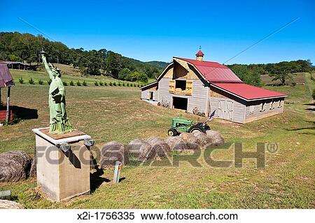 Stock Photography - A small replica of the Statue of Liberty on a rural farm near Franklin, South Carolina. Fotosearch