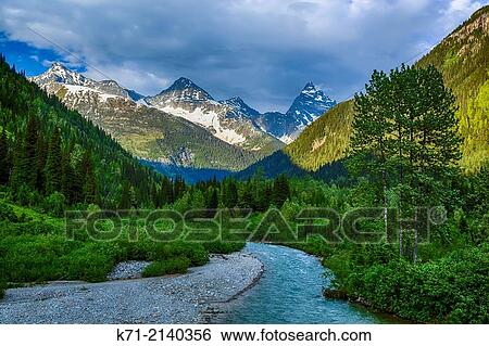 A small stream and mountain valley in Glacier National Park, British Columbia, Canada. View Large Photo Image Stock Photograph - A small stream and mountain valley in Glacier National Park, British Columbia, Canada.. Fotosearch