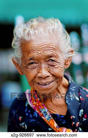 A smiling elderly woman, Yogyakarta, Indonesia View Large Photo Image Stock Photo - A smiling elderly woman, Yogyakarta, Indonesia. Fotosearch