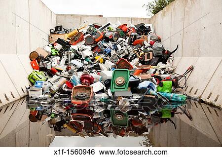 Stock Photograph - a stack of hard plastic waste ready to be recycled, UK. Fotosearch
