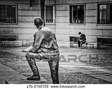 Stock Photo - A statue in a central square of Madrid city, Spain.. Fotosearch